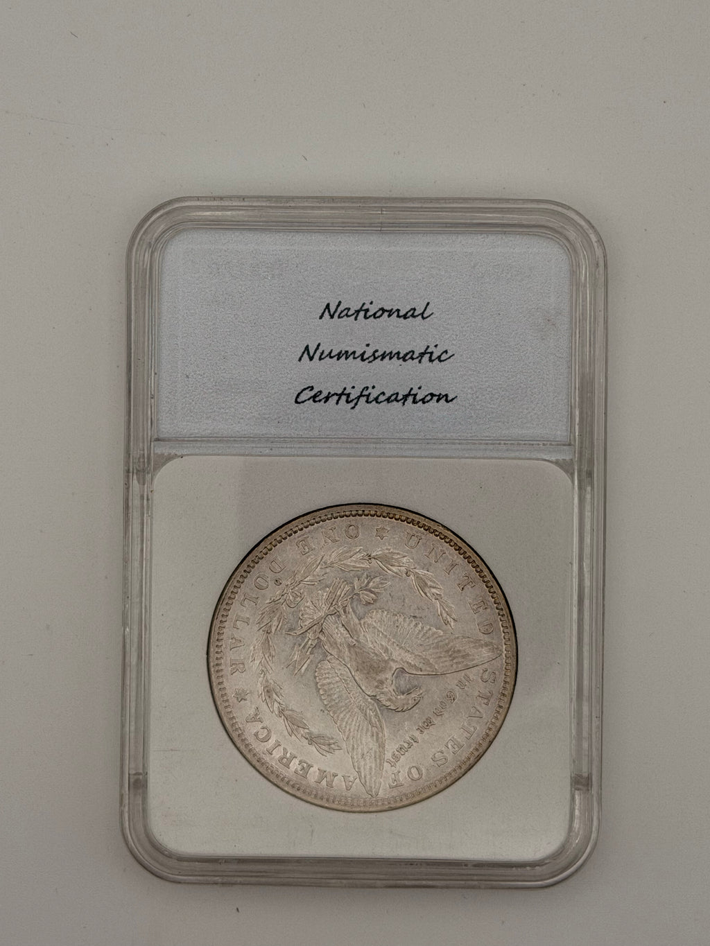1882-O Morgan Silver Dollar AU55 — NNC Certified
