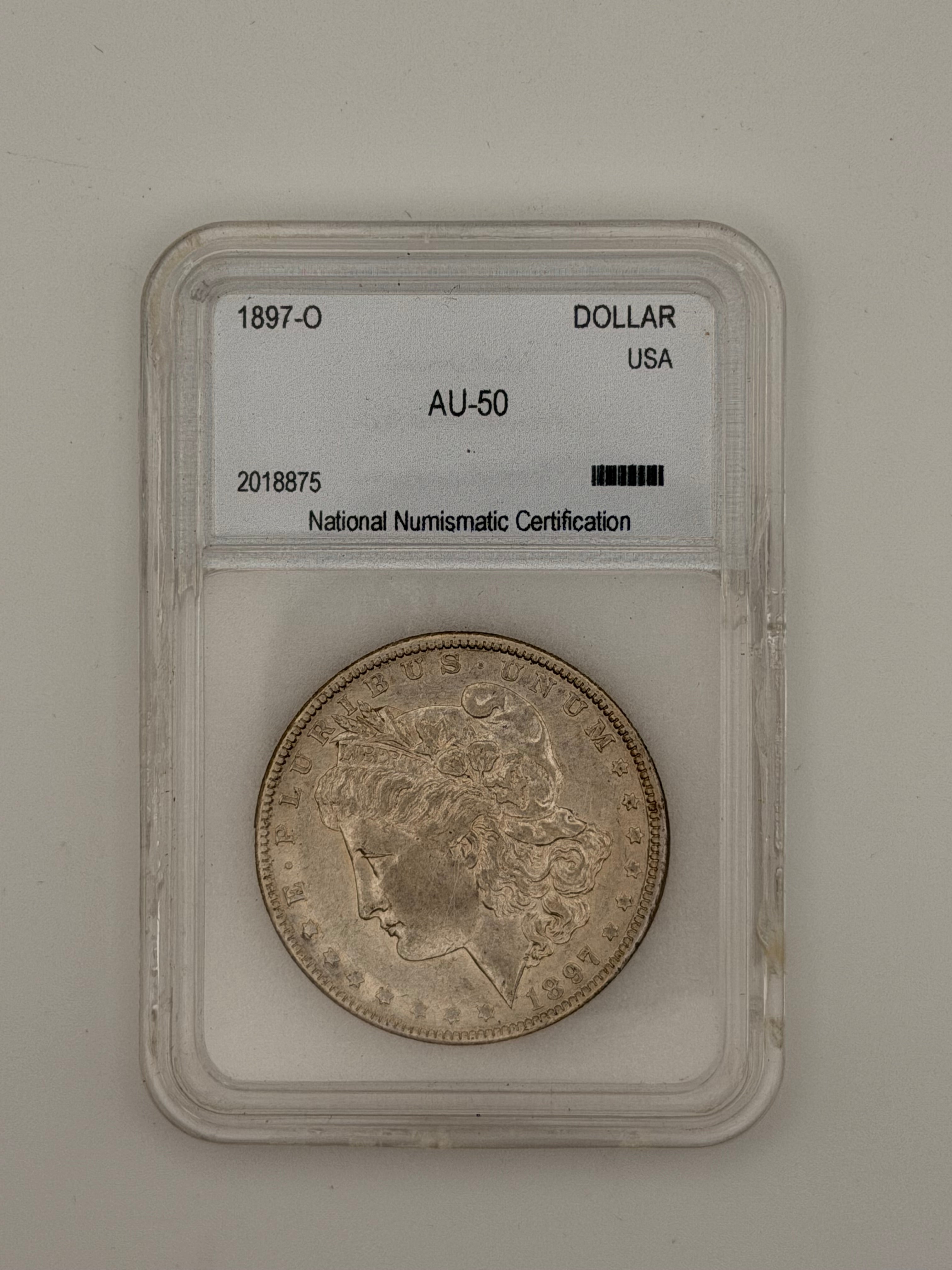 1897-O Morgan Silver Dollar AU50 — NNC Certified