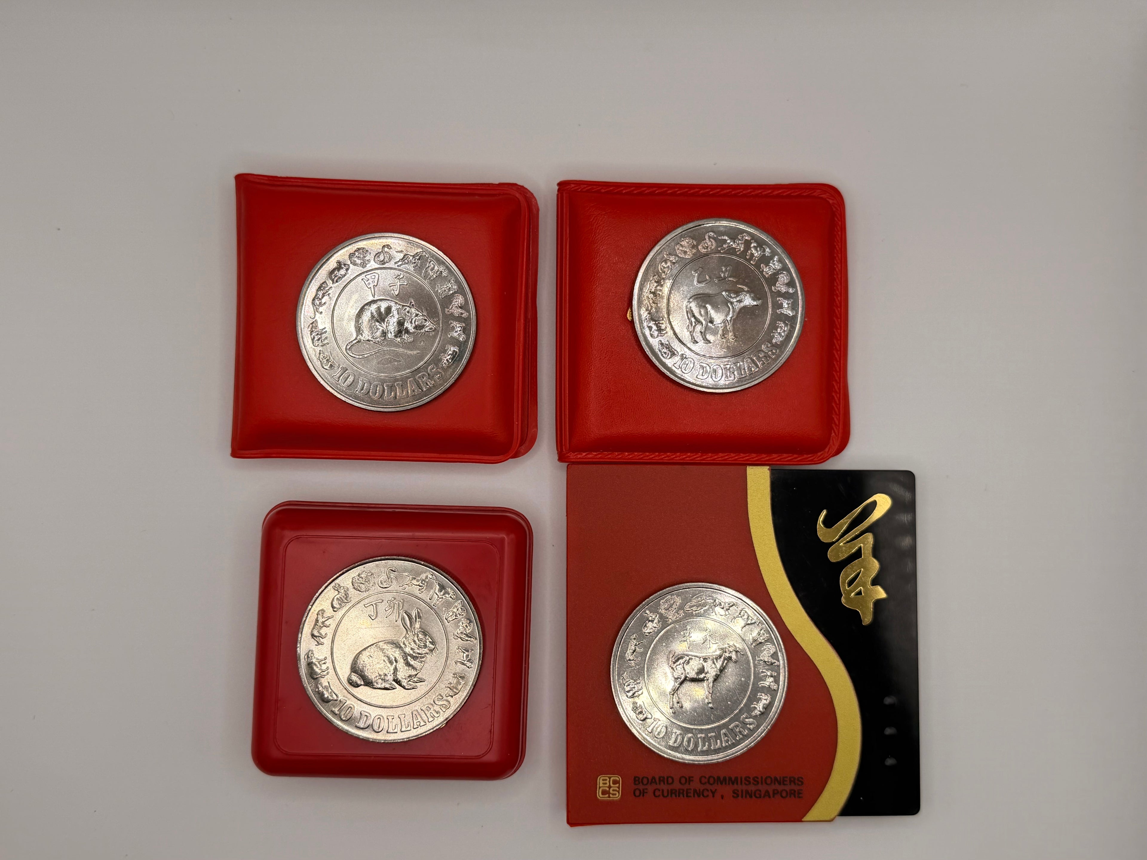 [Set of 4] 1984 - 1991 Singapore Lunar Cupro-Nickel $10 Coins