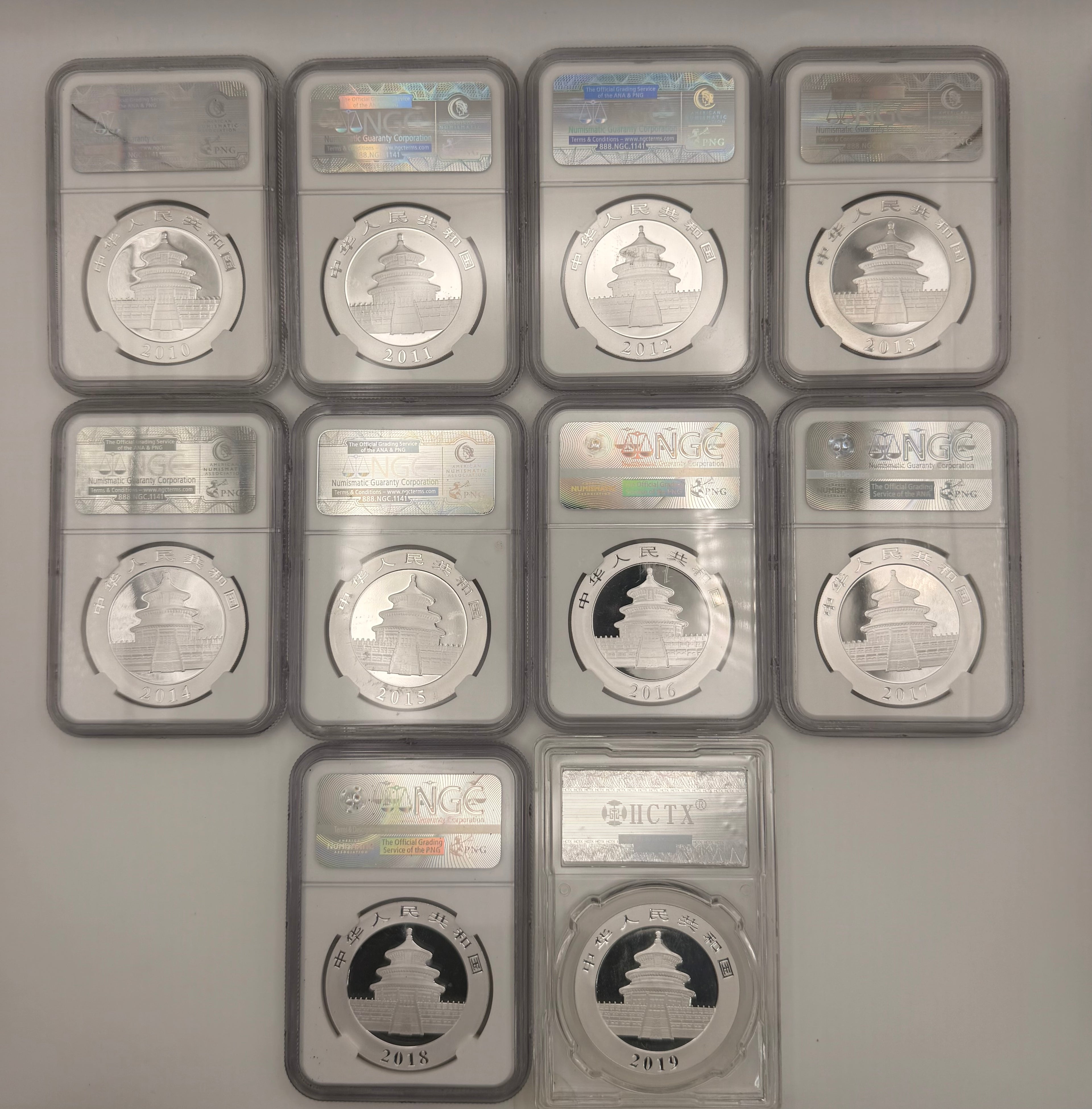 [Set of 10] 2010 - 2019 China 10 Yuan Panda Graded Coin Set