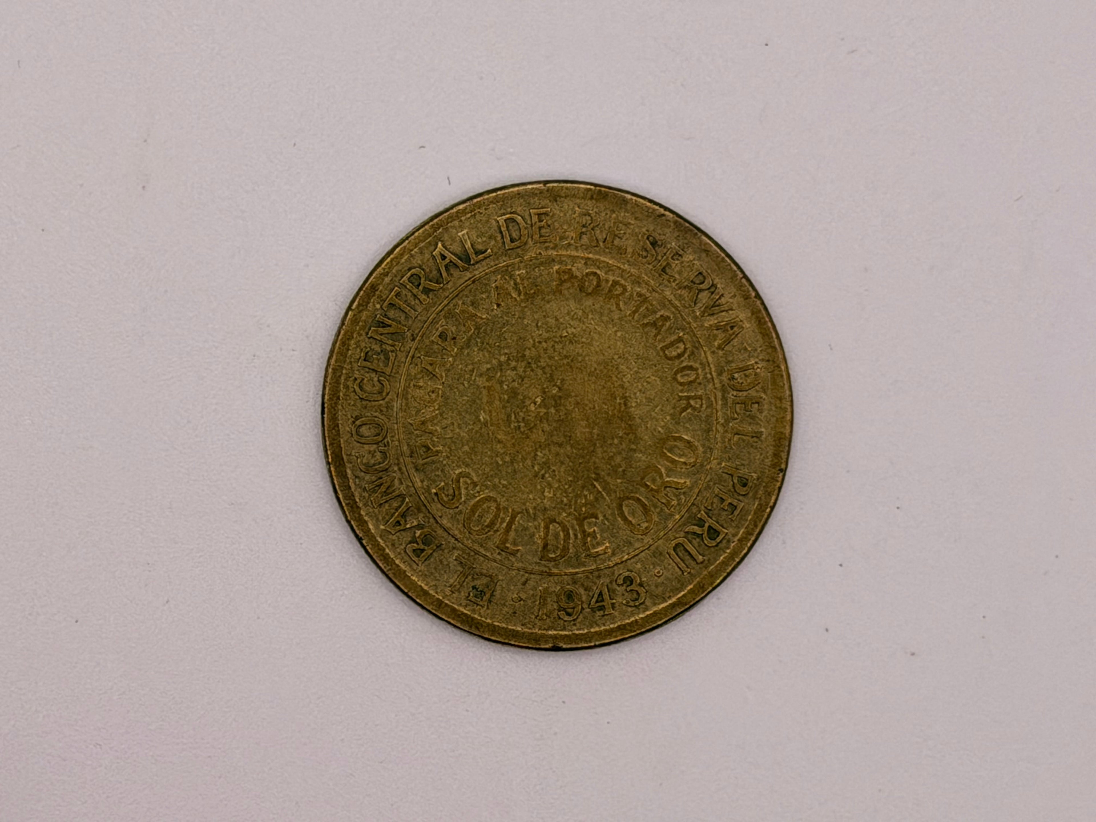 1943 Peru brass 1 Sol de Oro Coin