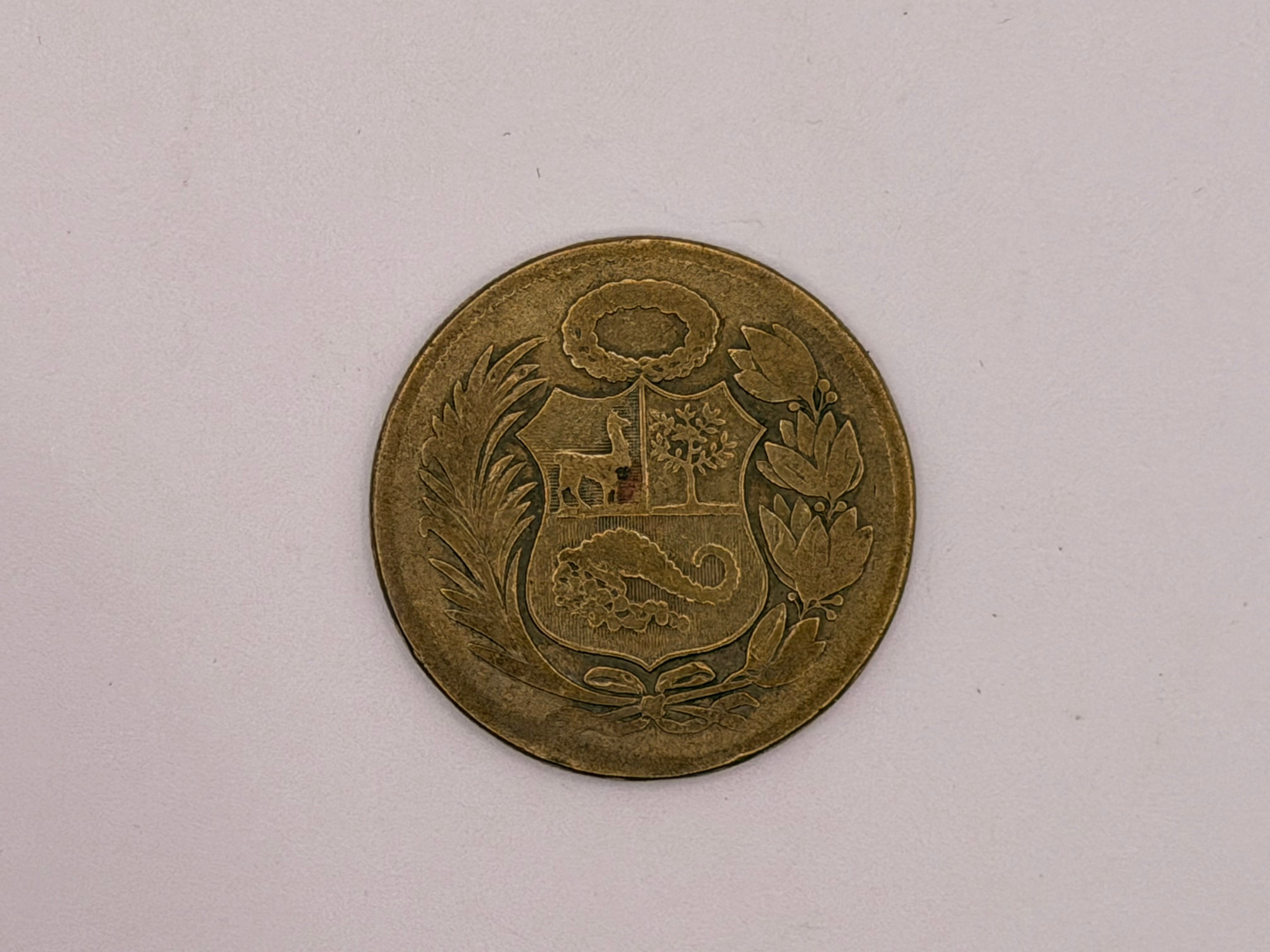 1943 Peru brass 1 Sol de Oro Coin
