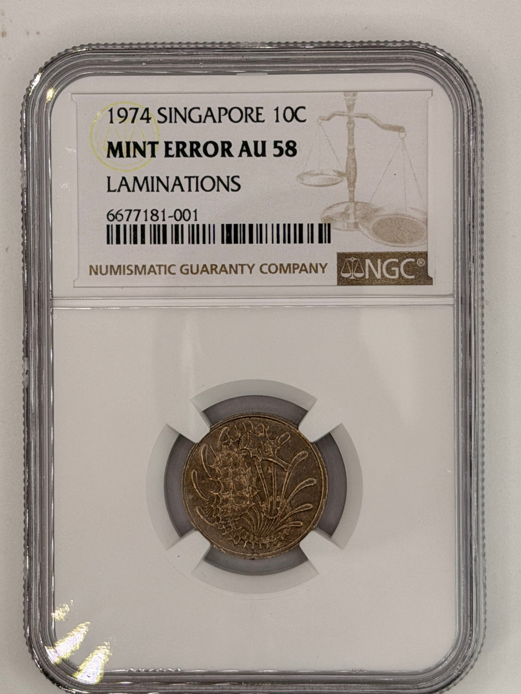 1974 年 - 新加坡 10 分铸币错误 AU 58 层压板