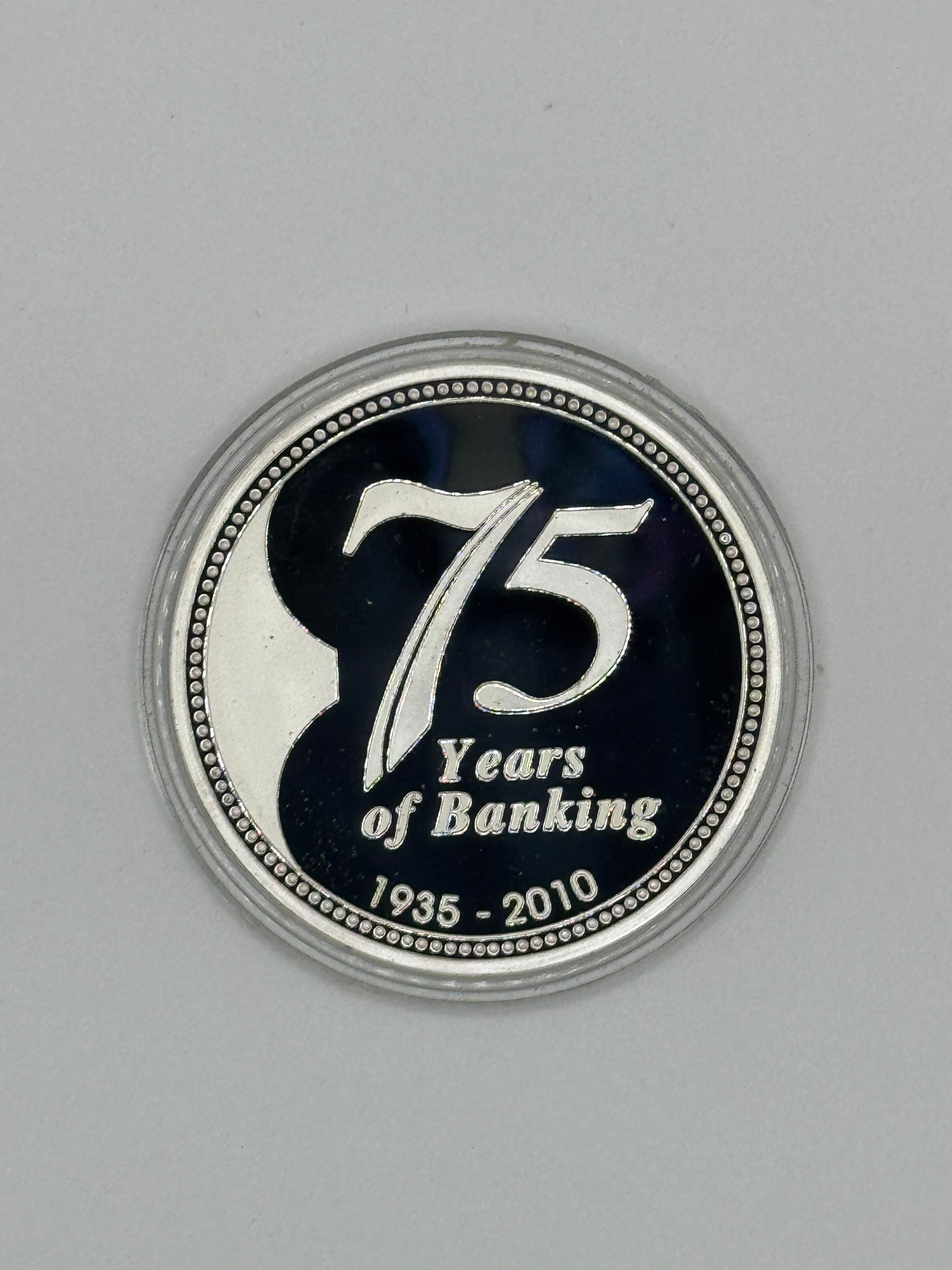 1935 - 2010 - Singapore UOB 75 Years of Banking Silver Coin
