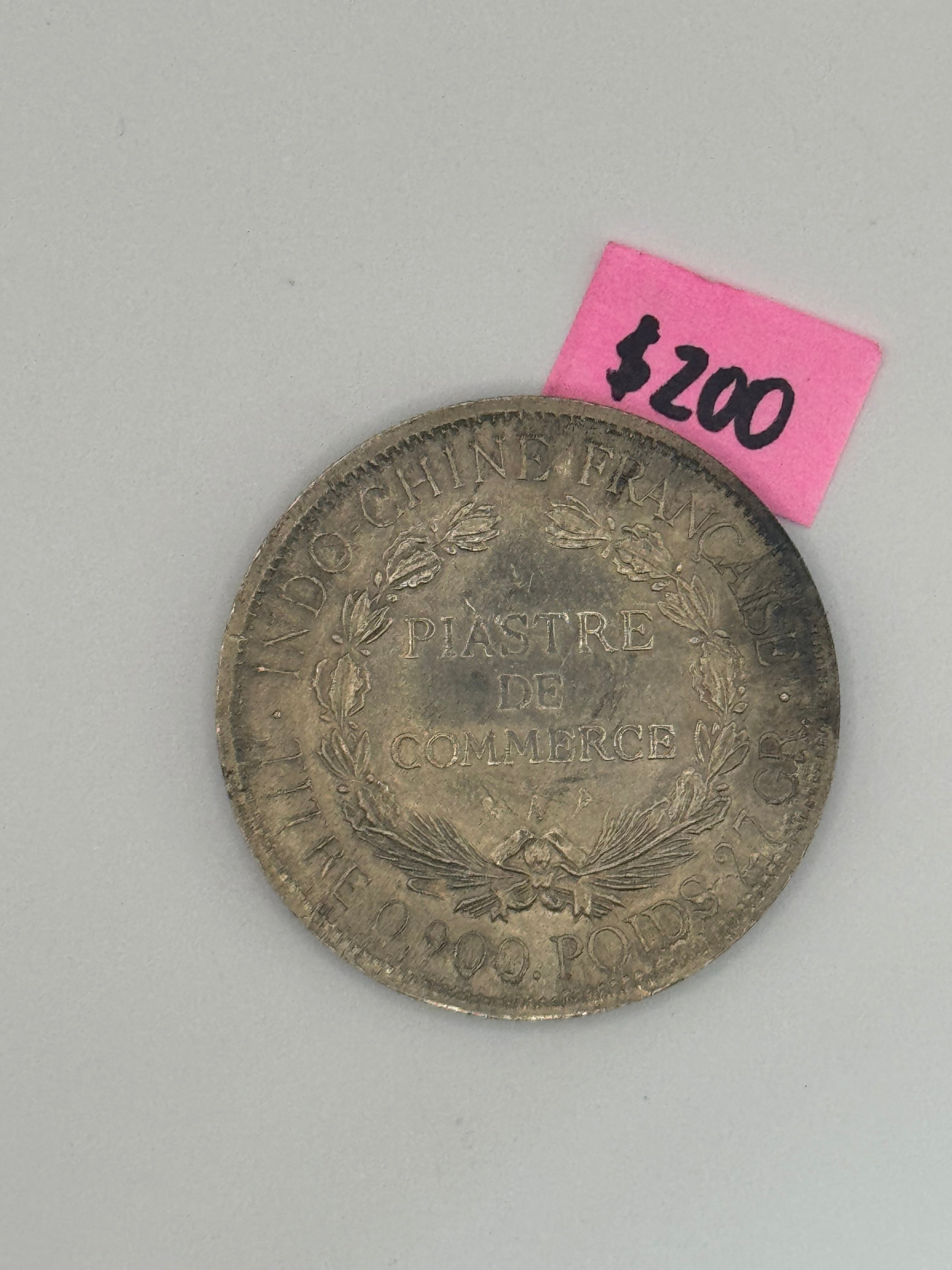 1895 - 1928 - French Indo China 1 Piastre Silver Coin